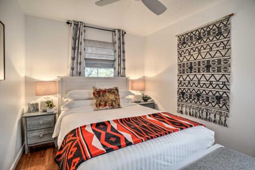 a white bedroom with a bed and a window at Modern Bungalow with Santa Fe Charm Less Than 2 Mi to Plaza in Santa Fe