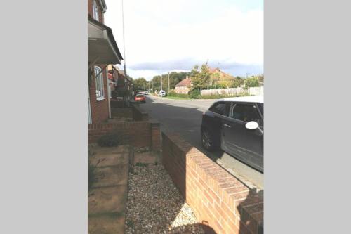 a car parked on the side of a street at Lavender House in Edwinstowe