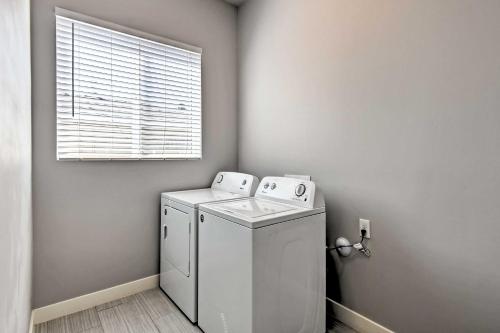 a washing machine in a room with a window at 7 Mi to Dtwn Phoenix Group-Friendly Getaway in Phoenix