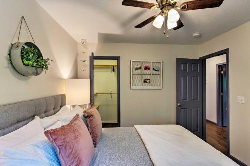a bedroom with a bed and a ceiling fan at Home with Deck and Game Room - 8 Mi to Asheville in Fairview