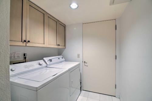 a white washer and dryer in a small kitchen at Luxury Home with Pool and Spa - 3 Mi to Natl Park! in Rancho Mirage