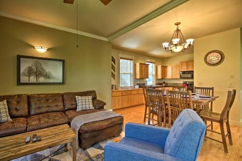 a living room with a couch and a table at Redmond House with Community Amenities Access in Redmond