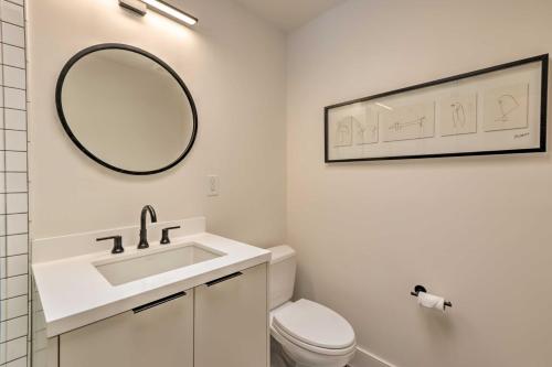 a white bathroom with a sink and a mirror at Menlo Park Studio about 2 Mi to Stanford University in Menlo Park