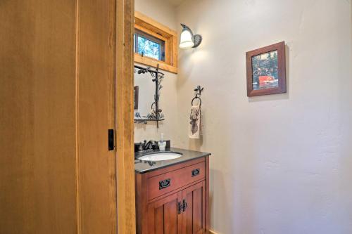 a bathroom with a sink and a mirror at Hot Tub and Lake Tahoe Views Kings Beach Lodge in Kings Beach