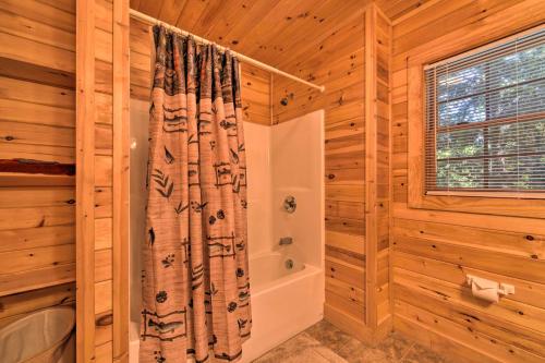 a bathroom with a shower and a shower curtain at A Bit of Heaven Cabin Less Than 13 Miles from Boone! in Fleetwood