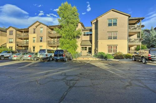 a parking lot in front of a apartment building at Walkable Dtwn Condo about 5 Miles to Beaver Creek Ski! in Edwards