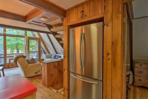 a kitchen with a stainless steel refrigerator in a cabin at Ski Chalet on Saco Less Than 2 Mi To Attitash Resort! in Bartlett