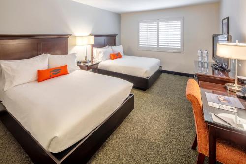 Collegian Hotel & Suites, Trademark Collection by Wyndhamにあるベッド