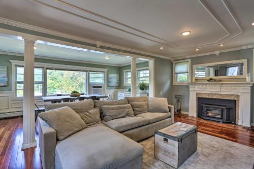 a living room with a couch and a fireplace at Lake Hopatcong Family Home with Boat Slip and Dock in Hopatcong