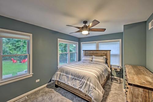 a bedroom with a bed and a ceiling fan at Updated Twin Lakes Cottage, Walk to Lake Mary in Twin Lakes