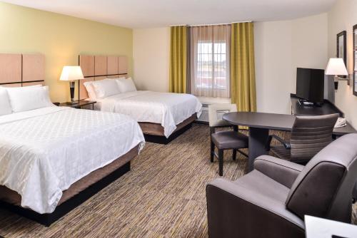 En eller flere senger på et rom på Candlewood Suites Sierra Vista, an IHG Hotel