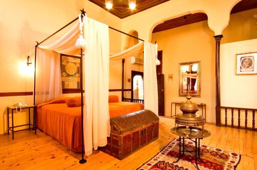 a bedroom with a large bed and a large window at Alp Pasa Hotel - Special Class in Antalya
