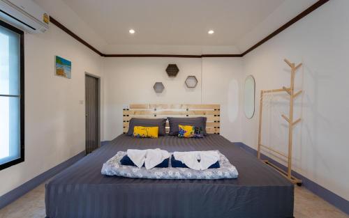 Postelja oz. postelje v sobi nastanitve Andaman Peace Resort