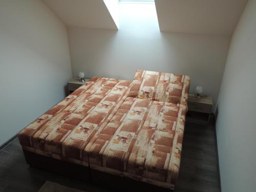 Voodi või voodid majutusasutuse Vila Danmar - rent whole vila or upper floor apartment toas