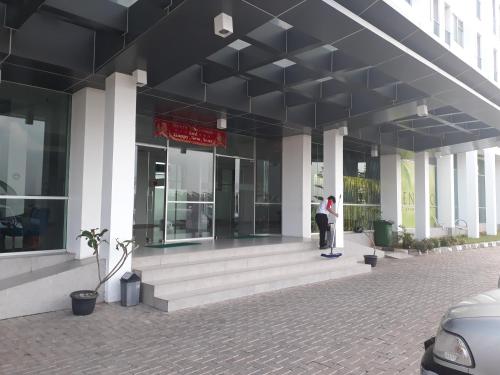 a person riding a skateboard outside of a building at ENVIRO Studio in Cikarang
