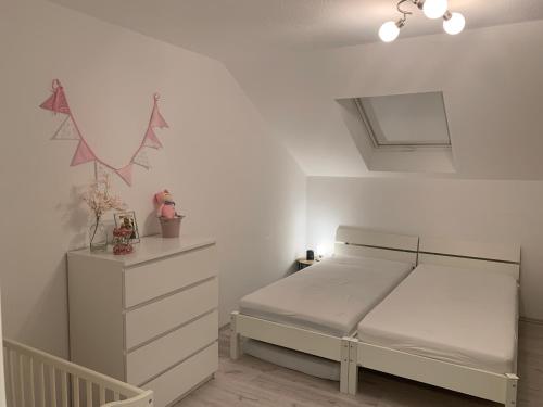 Tempat tidur dalam kamar di Haus Fasanenweg