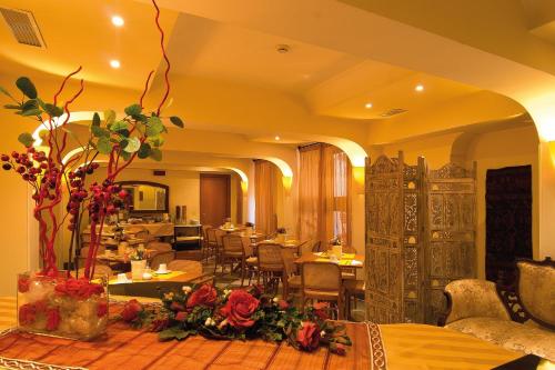 Restoranas ar kita vieta pavalgyti apgyvendinimo įstaigoje Hotel Novecento