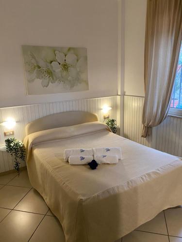Cama o camas de una habitación en Mini Hotel - Angolo Di Paradiso -