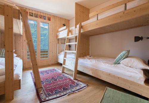 Двох'ярусне ліжко або двоярусні ліжка в номері Chalet Sonneck