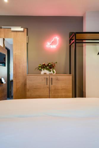 Letto o letti in una camera di coucou hotel & kuckucks-stube (Titisee)