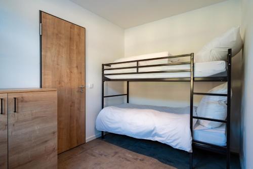 Letto o letti in una camera di coucou hotel & kuckucks-stube (Titisee)