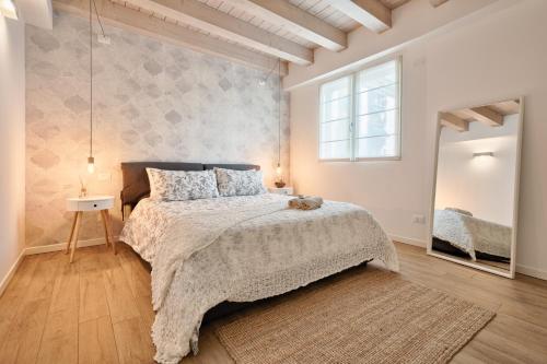 Voodi või voodid majutusasutuse Trevisohome BOTTENIGA toas
