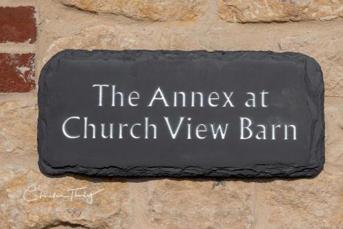 a sign that says the answer at church view barn at The Annex at Church View Barn in Snitterby