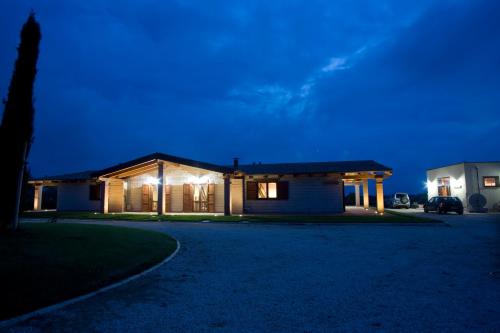 a house at night with the lights on at Podere 1248 in Ladispoli