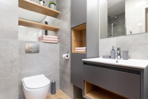 Kúpeľňa v ubytovaní Apartament Bursztyn II Klifowa