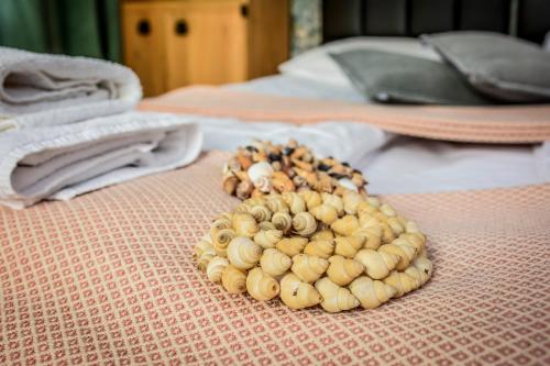 a bunch of bananas sitting on top of a bed at Willa Bryza in Gdynia