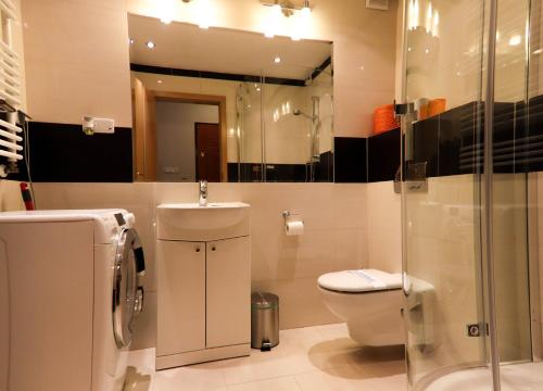 Kúpeľňa v ubytovaní Apartamenty Świnoujście - Apartament wiosenny Rezydencja Żeromskiego
