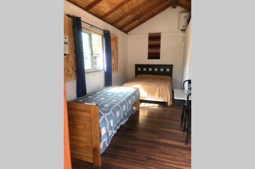 En eller flere senge i et værelse på Poseidon ll