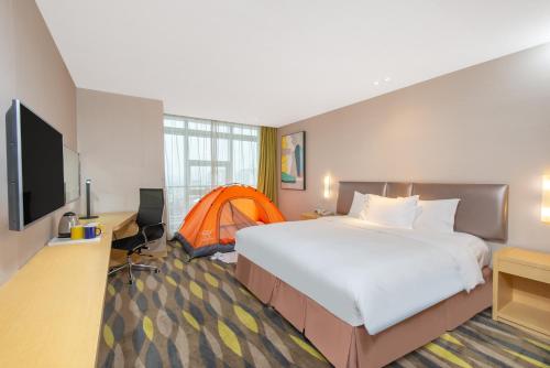 Postel nebo postele na pokoji v ubytování Holiday Inn Express Changzhou Lanling, an IHG Hotel