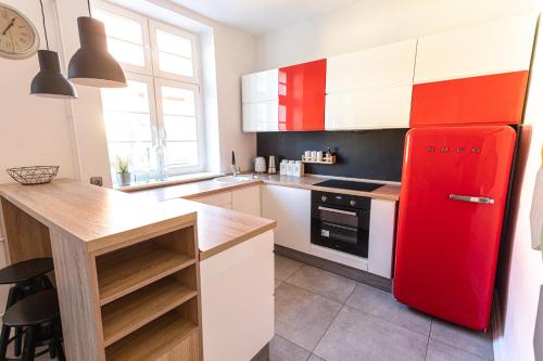 Kuchyň nebo kuchyňský kout v ubytování Republika Kopernika Apartment