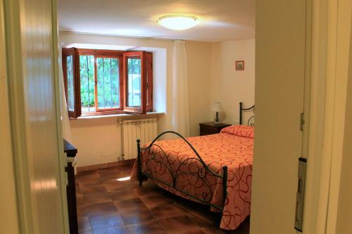 Llit o llits en una habitació de Torre Saline sotto pineta sul mare della Giannella