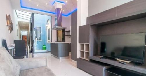TV a/nebo společenská místnost v ubytování Cittadella b&b
