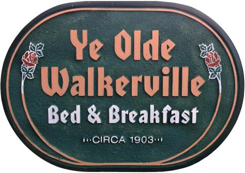 a sign for a bar with the words ye oldwaderulic bed and breakfast at Ye Olde Walkerville Bed & Breakfast in Windsor