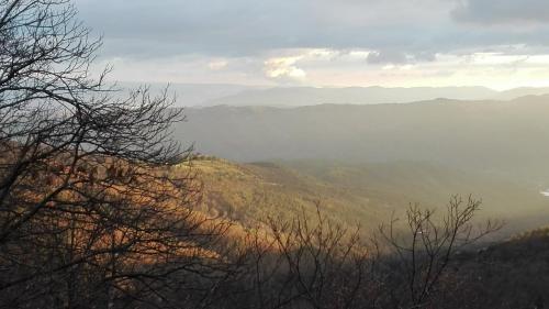 a view of a misty valley from a mountain at GITE Le CERISIER VIA RHONA DOLCE VIA in La Voulte-sur-Rhône