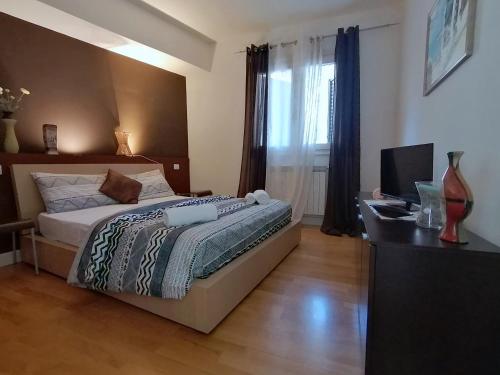 En eller flere senge i et værelse på Taormina Panoramic - Taormina Holidays