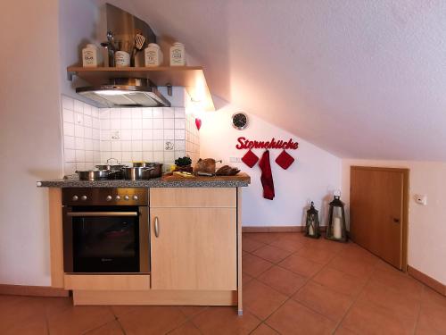 Kuchyň nebo kuchyňský kout v ubytování Ferienhaus Alexandra