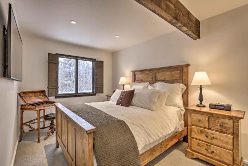 A bed or beds in a room at Vail Condo with Mtn View Deck - Steps to Ski Shuttle