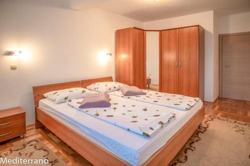 Katil atau katil-katil dalam bilik di Villa MEDITERRANO Pool & Tavern Mostar