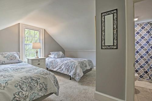 A bed or beds in a room at Beautiful Lenox Home, 3 Mi to Shakespeare and Co!