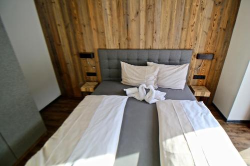 Postel nebo postele na pokoji v ubytování Chalet West