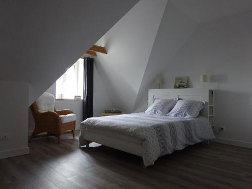 Voodi või voodid majutusasutuse Gîte de la Roche - Grande maison bretonne toas