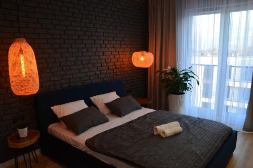 Posteľ alebo postele v izbe v ubytovaní Last Floor Apartment - Krakow City Center close to Old Town