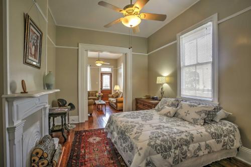 a bedroom with a bed and a ceiling fan at Classic New Orleans Home Near River, Zoo and Tram! in New Orleans
