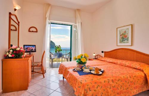 Postel nebo postele na pokoji v ubytování Hotel Citara