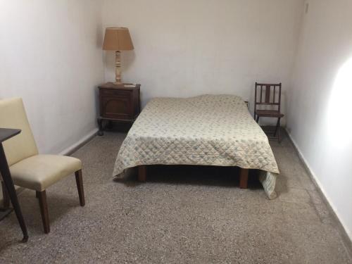 Ένα ή περισσότερα κρεβάτια σε δωμάτιο στο Gimenoz Apart