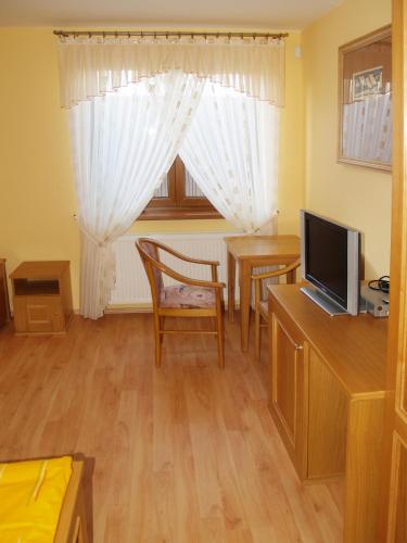 TV a/nebo společenská místnost v ubytování Villa Filip
